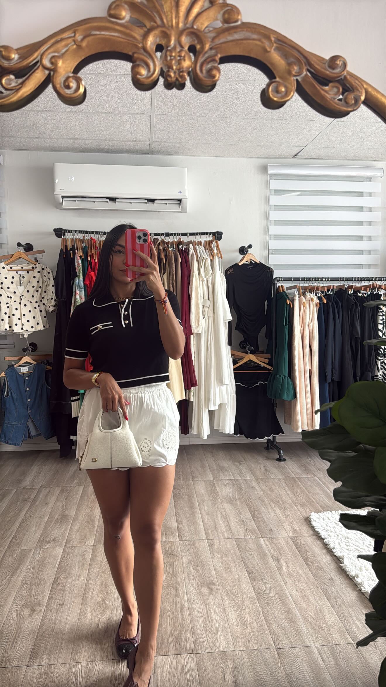 Black and white knit polo